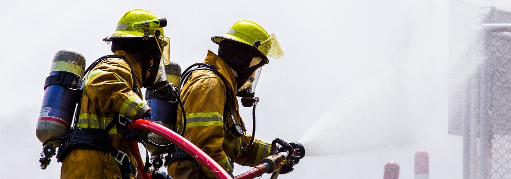 nj firefighters exam in front of fire