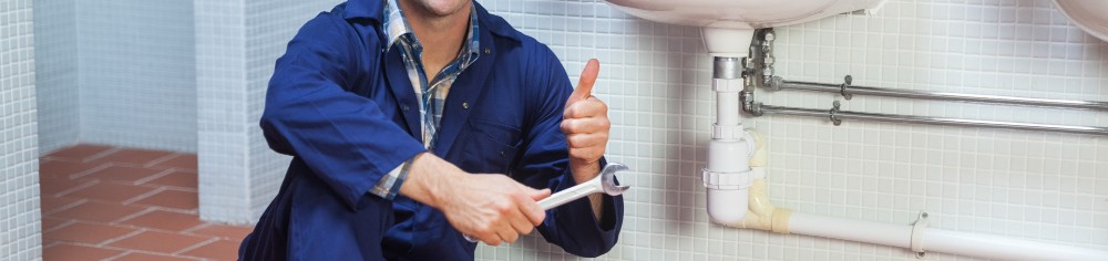 master plumber working a sink