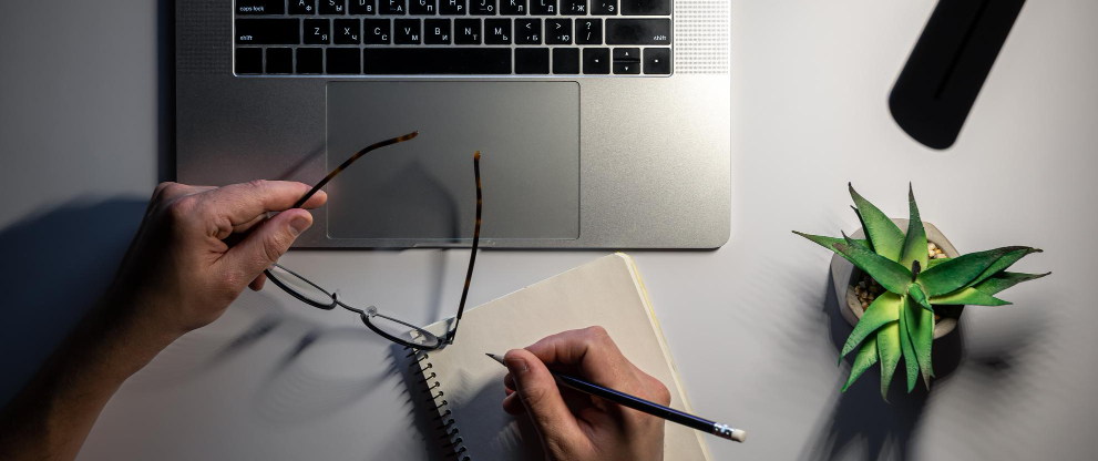 Pair of hands near a keyboard